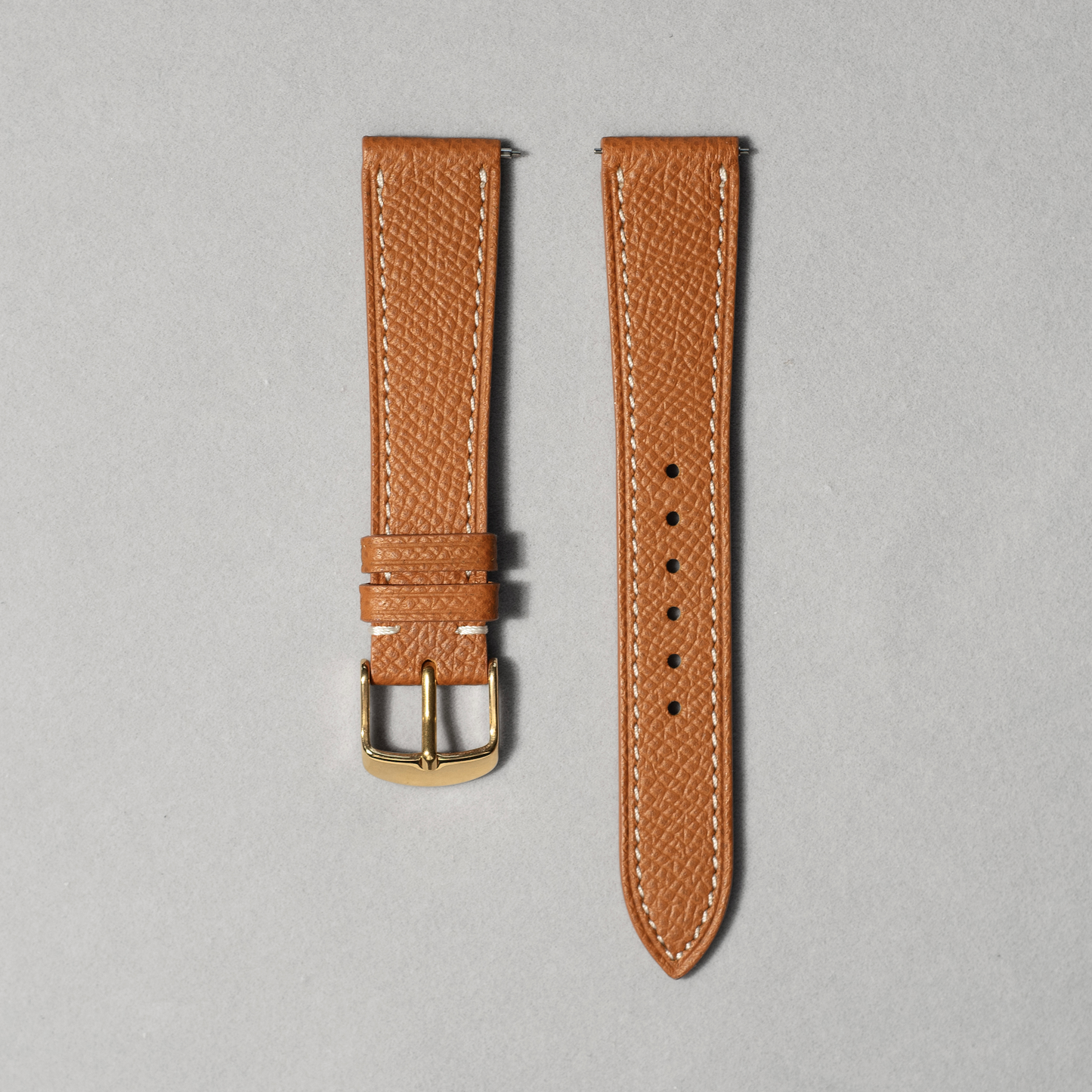 Handcrafted Epsom leather in brown with white stitching. comes with quick release spring bar. available in 17-20mm lug widths