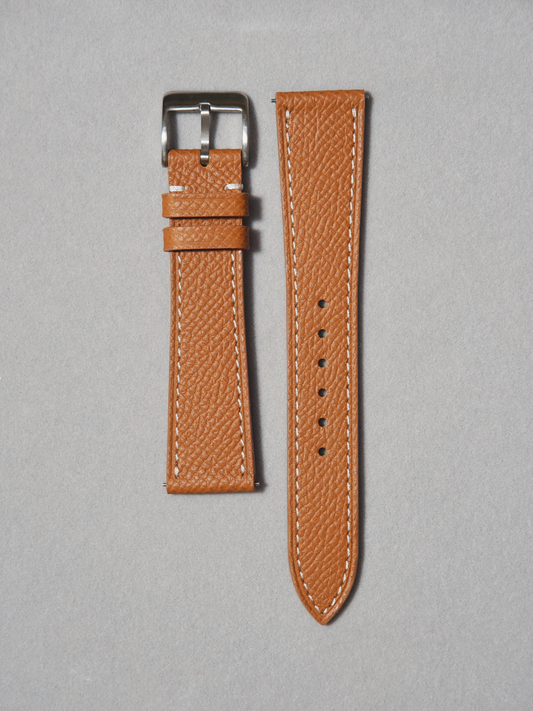 Handcrafted Epsom leather in brown with white stitching. comes with quick release spring bar. available in 17-20mm lug widths