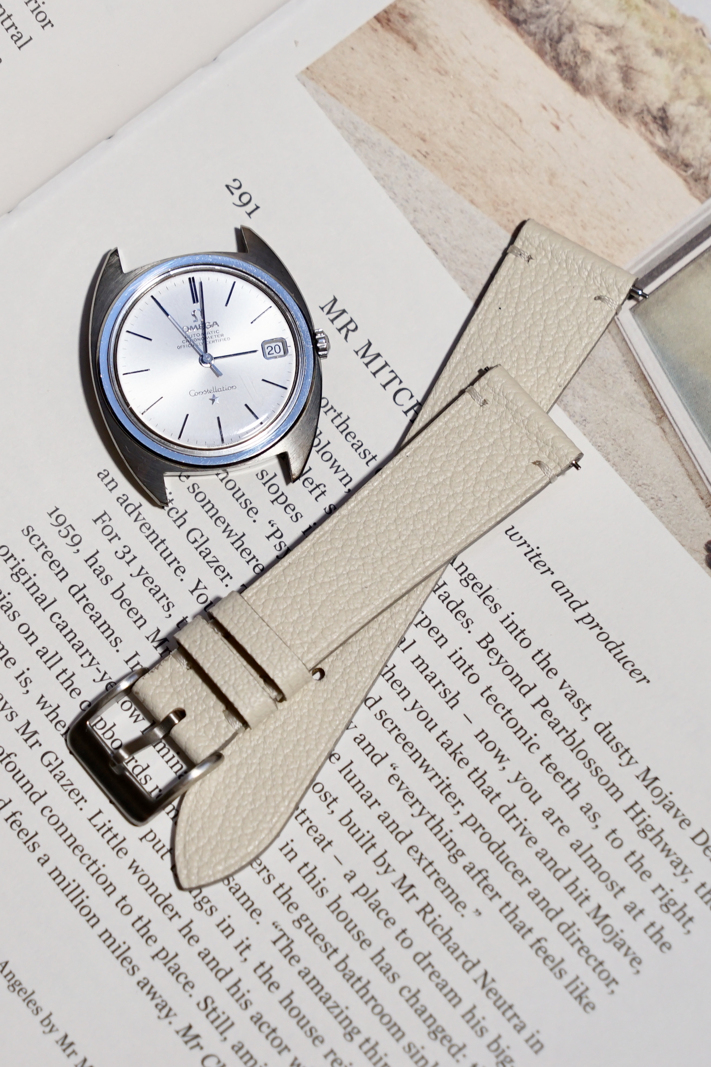 Omega Constellation with two stitch alran watch strap in cream white