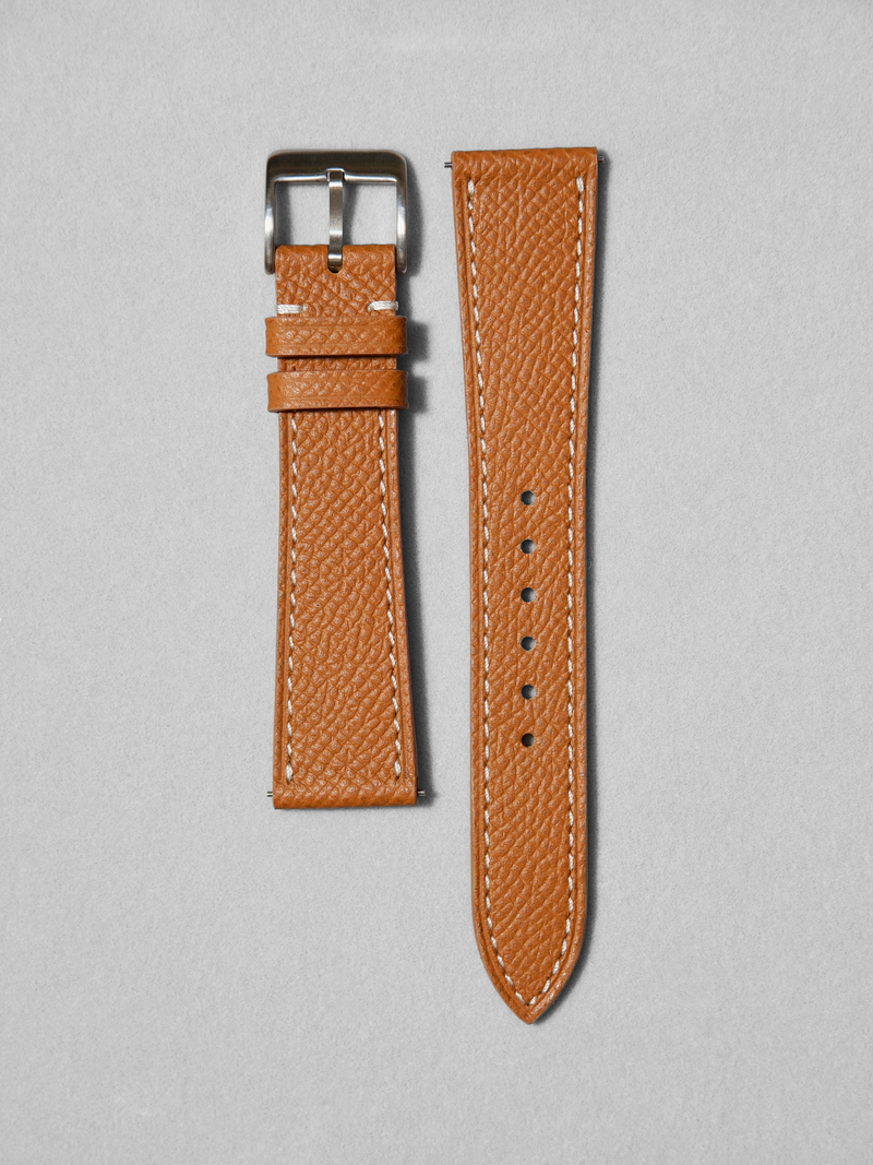 Handcrafted Epsom leather in brown with white stitching. comes with quick release spring bar. available in 17-20mm lug widths